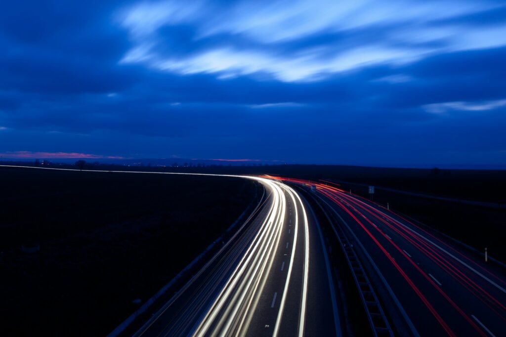 Cars moving fast on a highway